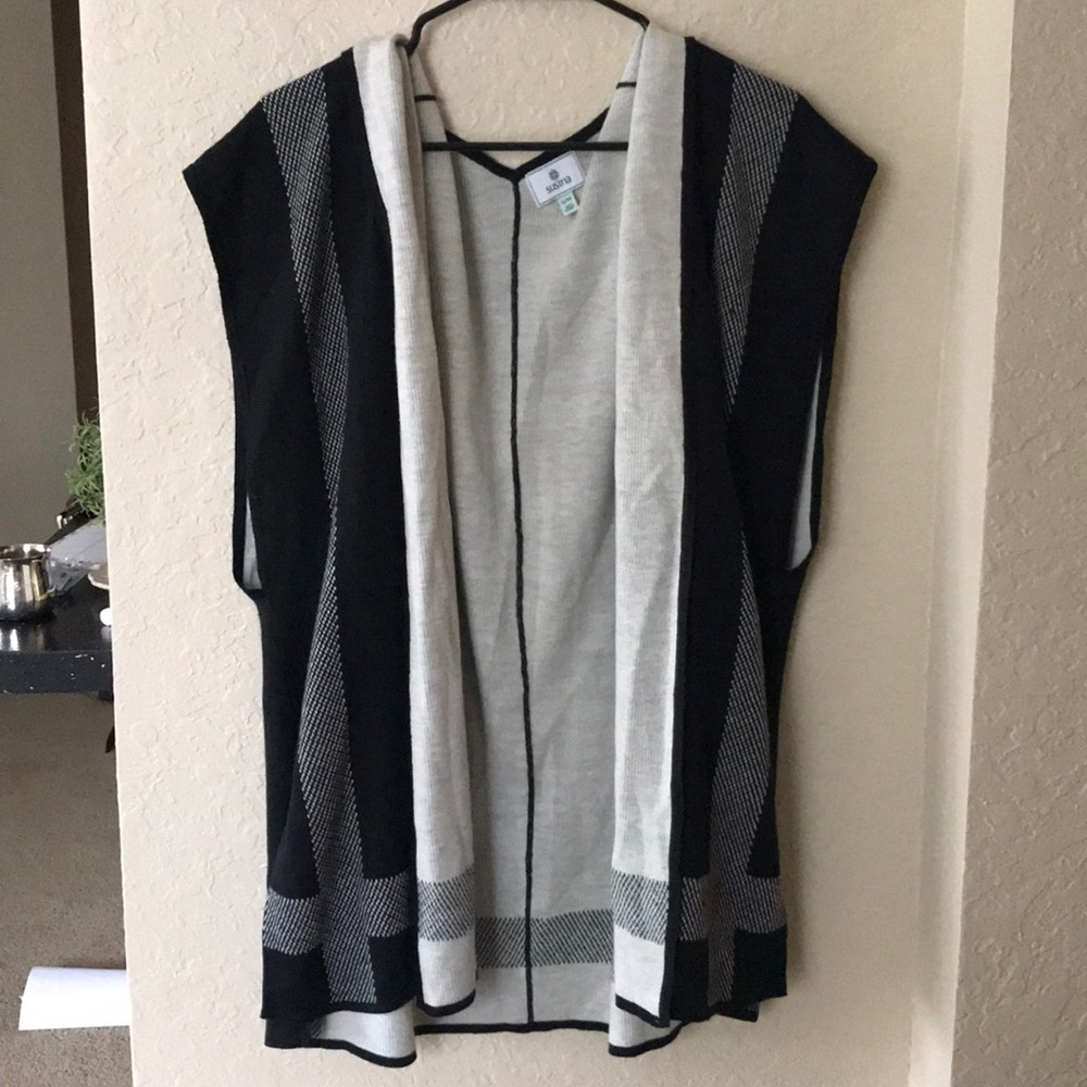 Sleeveless cardigan sweater. Worn twice!